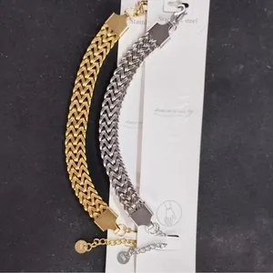 Chic woven stainless steel arrow bracelets in gold and silver finish with extension chain