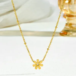 Elegant gold titanium steel daisy pendant necklace with beaded chain and zircon stone