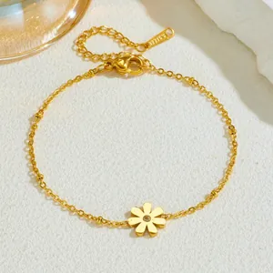 Gold-plated daisy flower stainless steel necklace with small beads and crystal center