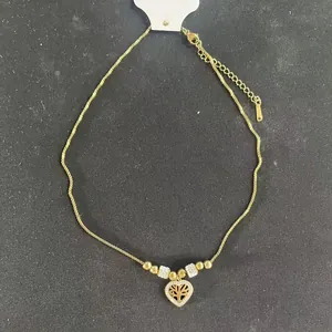 Adjustable golden tree of life heart pendant necklace with rhinestones and bead details