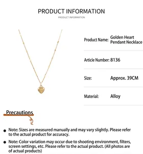 Detail view of 39cm golden heart pendant necklace with alloy material specifications