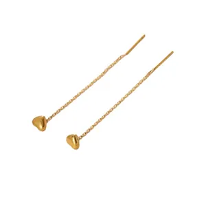 Elegant gold heart ear threaders featuring long slender chains and polished 3D heart pendants