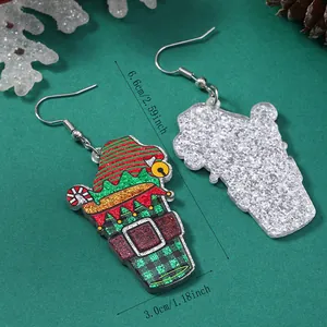 Christmas earrings detail showing size 6.6cm and acrylic glitter texture with holiday icons