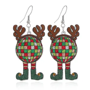 Christmas acrylic earrings with reindeer antlers and glitter socks on white background