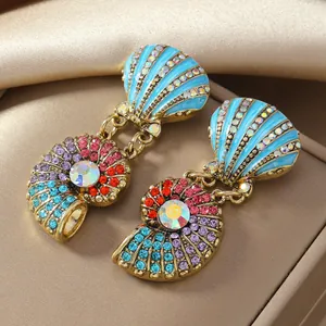 Ocean starfish and nautilus drop earrings with colorful crystals and blue enamel