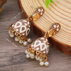 Detail shot of bohemian Jhumka earrings showing 4.2cm length and 2.0cm diameter measurements