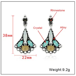 Detail view of teardrop zircon earrings with 38mm length and 22mm width dimensions