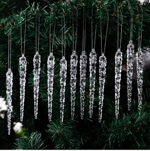 Macro view of 12 transparent acrylic icicle ornaments hanging on a Christmas tree