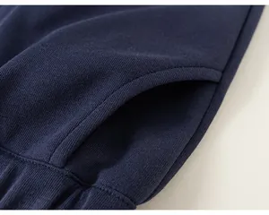 Macro view of navy blue cotton fabric texture and durable side pocket stitching detail