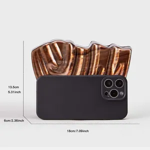 Tortoiseshell acrylic clutch bag size comparison with dimensions 18x13.5x6 cm