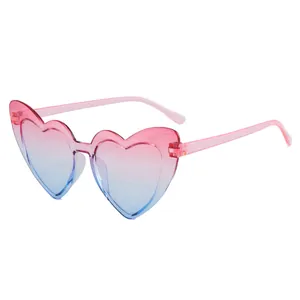 Pink and blue gradient heart-shaped sunglasses for kids with transparent frame