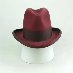 Classic burgundy wool felt fedora hat featuring a dark brown ribbon and pinch crown