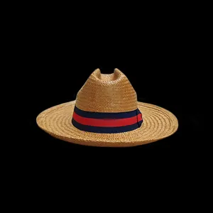 Panama straw hat with striped ribbon decoration in a classic Western cowboy style