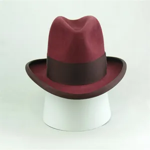 Classic burgundy wool felt fedora hat featuring a brown grosgrain decorative ribbon band