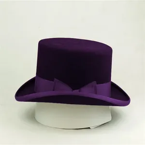 Classic dark purple wool felt top hat with satin ribbon bow on white background