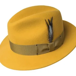 Ginger wool fedora hat with wide brim, grosgrain ribbon and spotted feather decoration