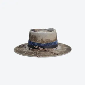 Detail of vintage wool felt hat with distressed texture and layered ribbon bands
