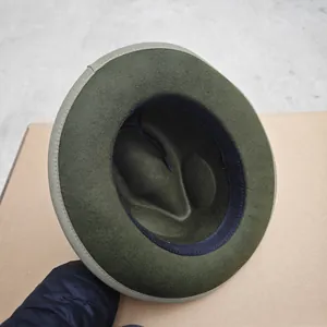 Inside view of wool fedora hat showing dark sweatband and adjustable drawstring detail