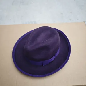 Deep purple wool felt fedora hat with matching satin ribbon band in a top-down view