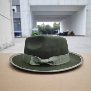 Classic olive green wool fedora hat featuring a light green grosgrain ribbon and bow