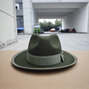 Classic dark green wool fedora hat with matching grosgrain ribbon and flat brim