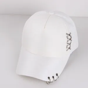 White hip hop baseball cap with silver metal rings and side chain detail