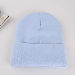 Classic light blue knit beanie with folded cuff for winter warmth and minimalist style