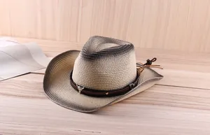 Close-up of western straw hat featuring gradient finish and silver bull head logo detail