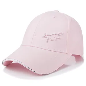 Detail view of pink cotton baseball cap featuring fox embroidery and branded inner brim tape