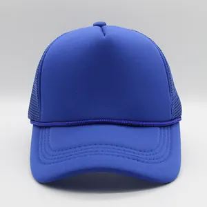 Detail view of navy blue trucker hat with foam front, mesh back and braided rope accent