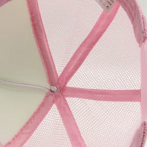 Detailed interior of a pink mesh sun cap showing reinforced stitching and breathable fabric