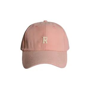 Pink washed cotton baseball cap with white embroidered R logo and curved brim visor