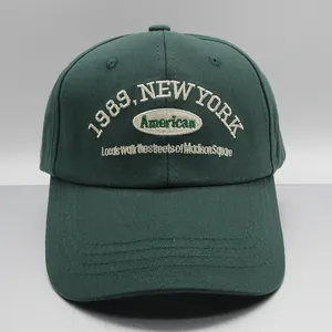 Dark green cotton baseball cap with vintage 1989 New York embroidery and patch