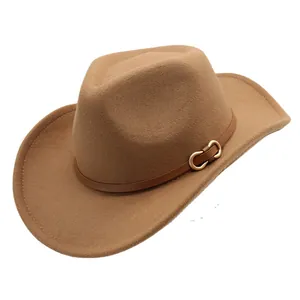 Vintage wool felt western cowboy hat in brown with a leather belt and metal buckle