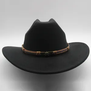 Detailed macro view of black wool felt cowboy hat with vintage bronze skull badge and band