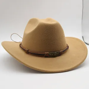 Detail of camel wool western cowboy hat featuring a leather band with skull metal plaque