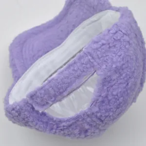 Detail of light purple lamb fleece cap showing the adjustable velcro back strap texture