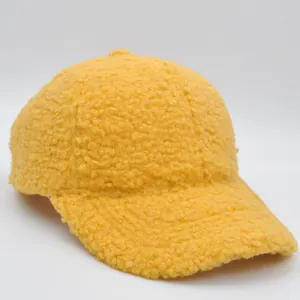 Ginger yellow sherpa baseball cap for kids featuring warm fleece and minimalist design