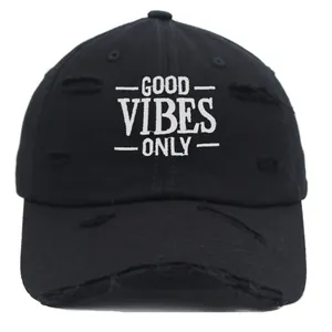 Distressed black baseball cap with white Good Vibes Only embroidery and ripped detail