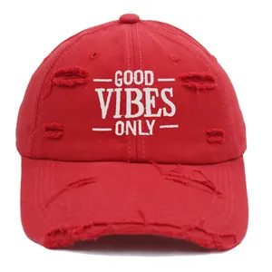 Distressed red baseball cap with GOOD VIBES ONLY embroidery and vintage torn finish