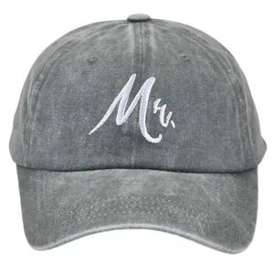 Close-up of the Mr. white embroidery on the washed grey cotton baseball cap