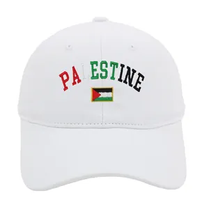 Close-up of Palestine flag embroidery and text on a white cotton baseball cap