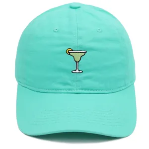 Close-up of Margarita cocktail embroidery on mint green cotton baseball cap