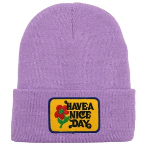 Purple ribbed knit beanie with Have a Nice Day yellow flower patch for women