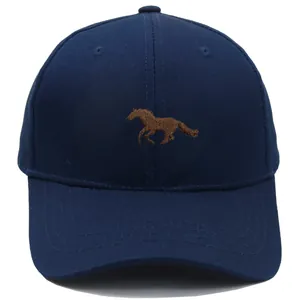 Detailed close-up of brown horse embroidery on a navy blue cotton baseball cap