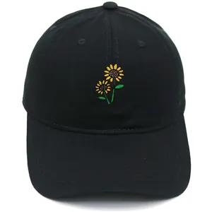Black cotton baseball cap with sunflower embroidery and a curved brim for sun protection