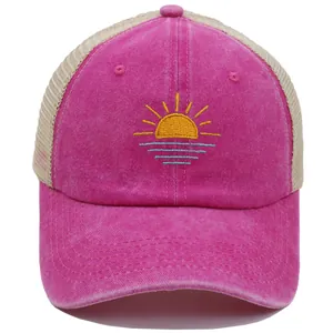 Pink trucker hat with seaside sunrise embroidery and breathable mesh back for summer