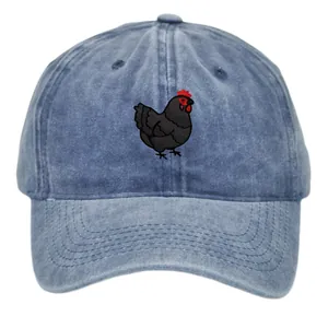 Close-up of rooster embroidery on vintage washed blue denim baseball cap detail