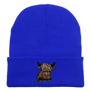 Royal blue knitted beanie with brown highland cow embroidery for men and women winter