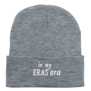 Gray knitted beanie with white in my ERAS era embroidery in minimalist style